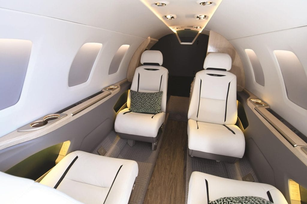 Cessna Citation M2 Gen2 private jet interior showing luxury cabin design and business productivity features
